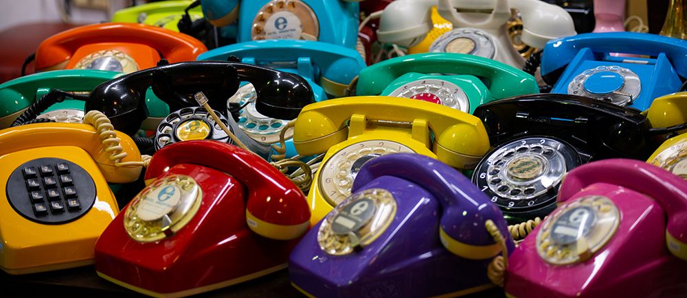 Argentina-Buenos Aires San Telmo Market-aka Mercado San Telmo Colorful vintage telephones